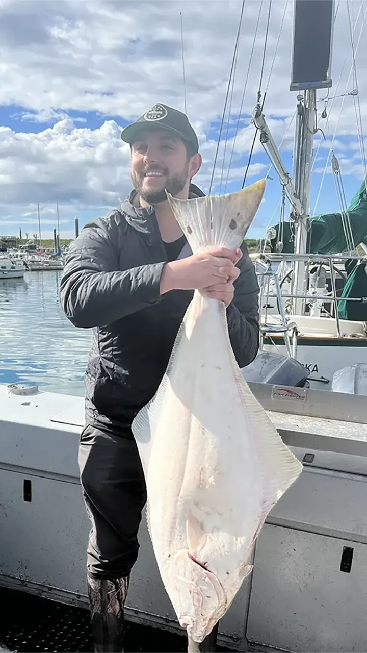 Drifters lodge staff show off their limits of halibut caught aboard Orion with Captain Jimmy Counts of Homer Halibut Hunters
